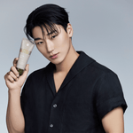 ATEEZ member holding BRMUD Relief Mud Mask – promoting gentle skincare with Boryeong mud